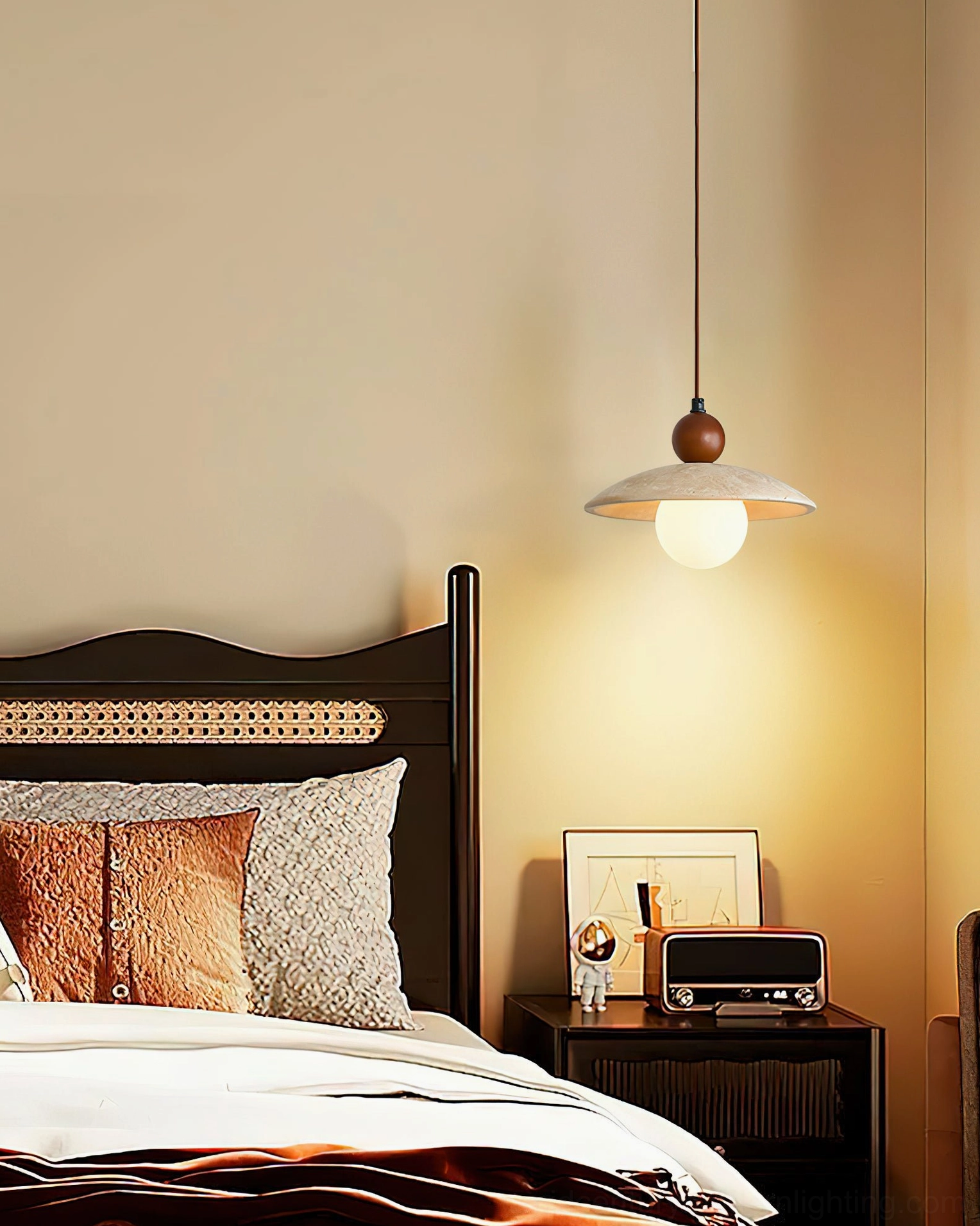 Ferox bedside pendant lamp with warm yellow glow in vintage-inspired home decor bedroom