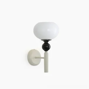 Feya minimalist globe wall lamp front view with opal glass sphere and dual-tone metal finish