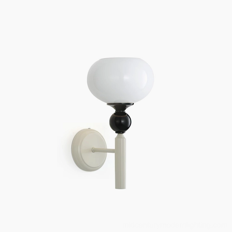 Feya minimalist globe wall lamp front view with opal glass sphere and dual-tone metal finish