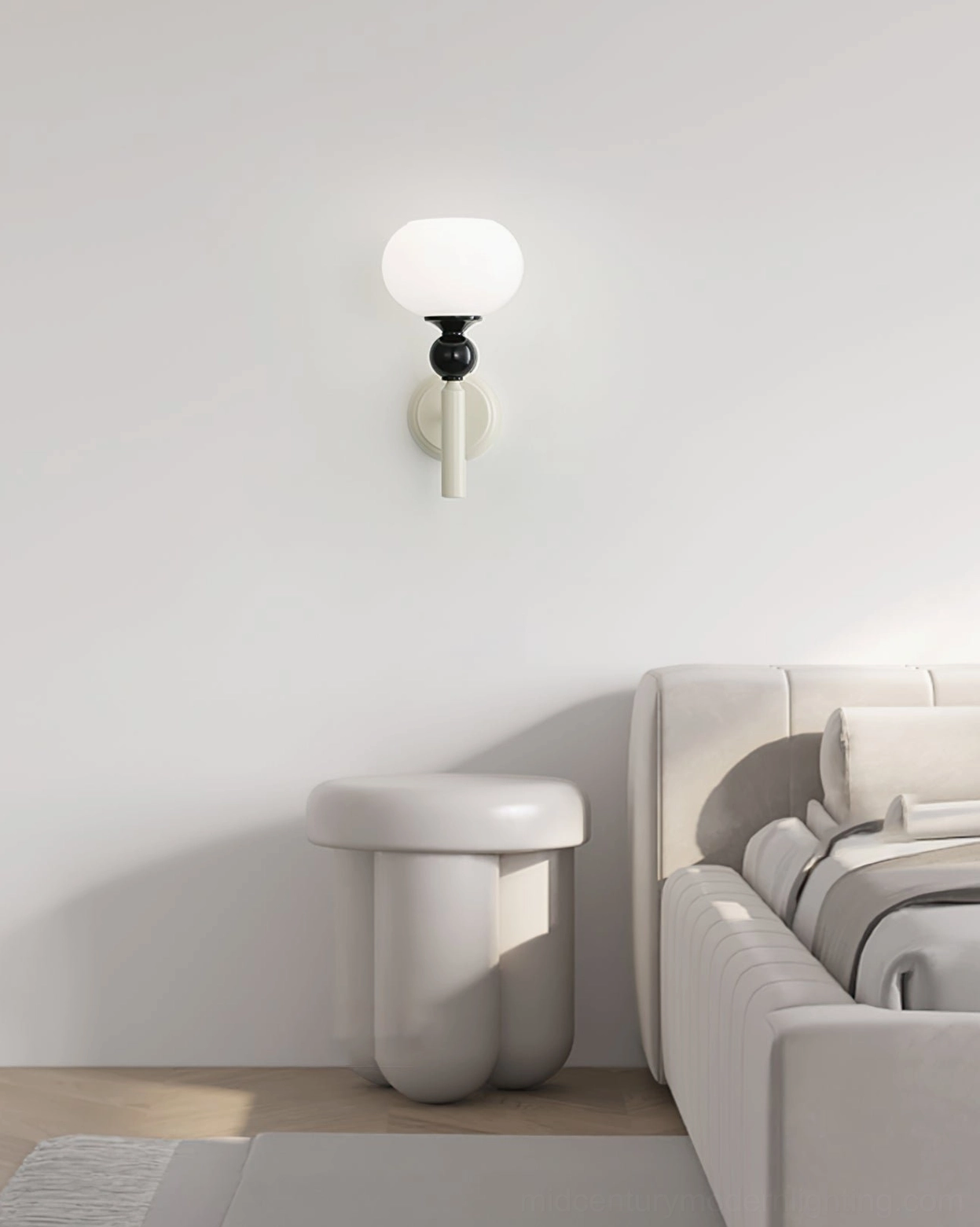 Feya globe wall lamp in contemporary living room setting with neutral minimalist decor