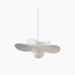 Fiksa organic petal pendant lamp with matte white metal finish, overhead studio view of sculptural design