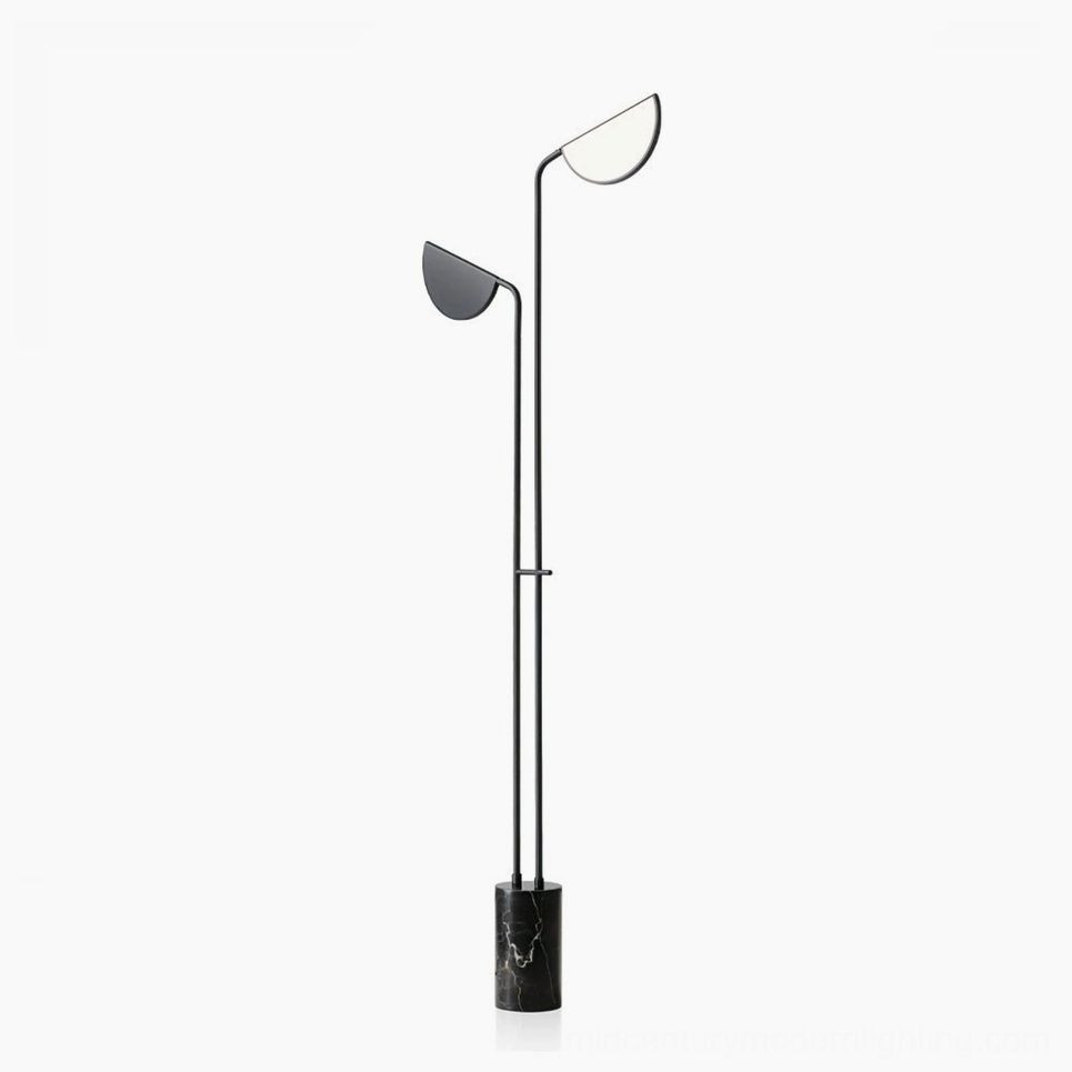Black Filo floor lamp with marble base and slender metal pole - minimalist contemporary lighting fixture detail