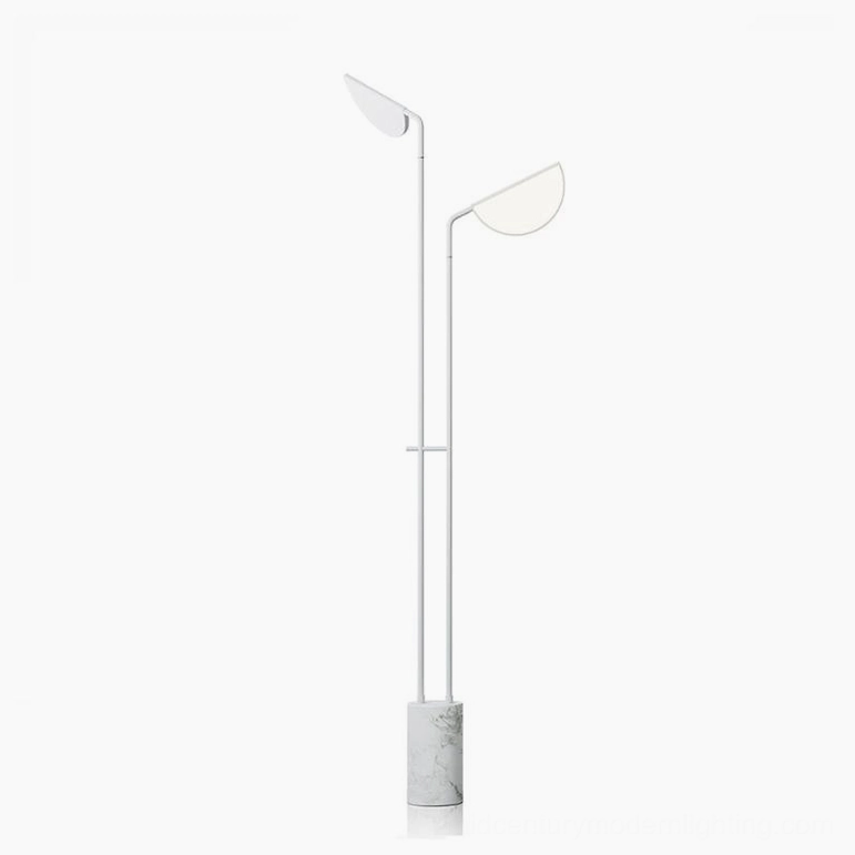 Filo minimalist floor lamp with dual leaf-shaped diffusers in white finish, sleek metal pole, and marble base - front studio view