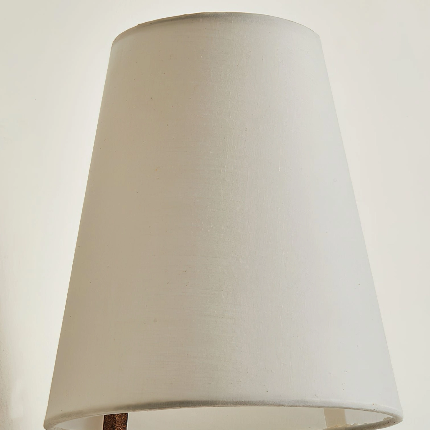Finley wall sconce fabric shade close-up detail, tapered off-white shade with oversized proportions