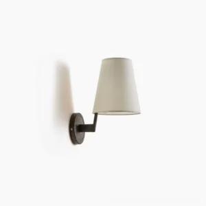 Finley mid-century modern wall sconce with matte black metal bracket and off-white tapered fabric shade, side profile view