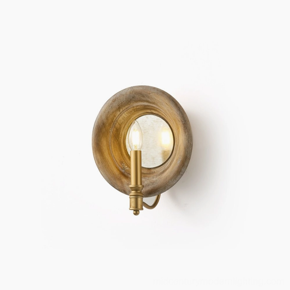 Finn mid-century modern wall sconce with weathered wooden circular frame and brass lamp holder, frontal studio view