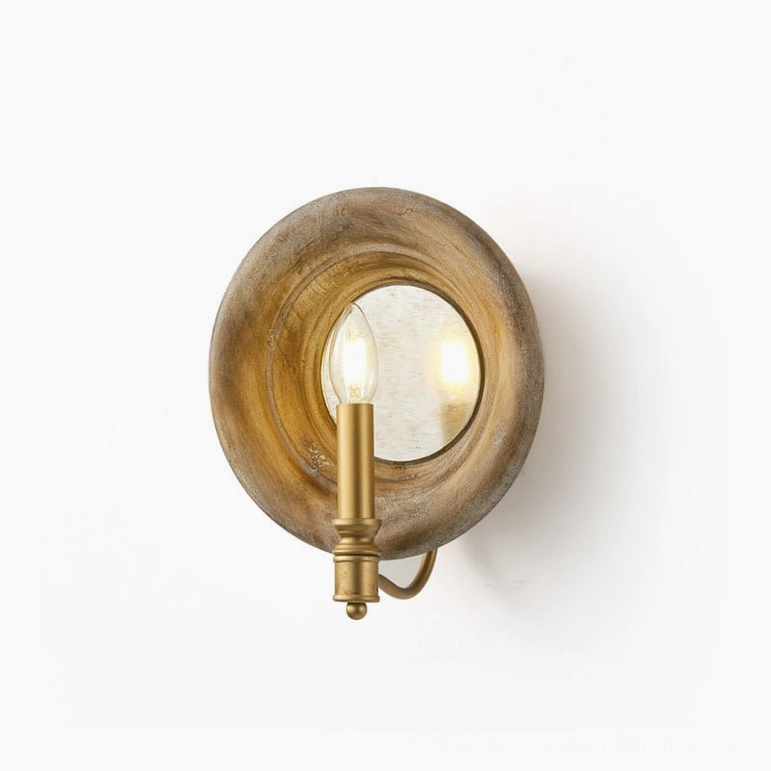Finn wall sconce frontal close-up studio shot with warm illuminated candle bulb, wood color finish