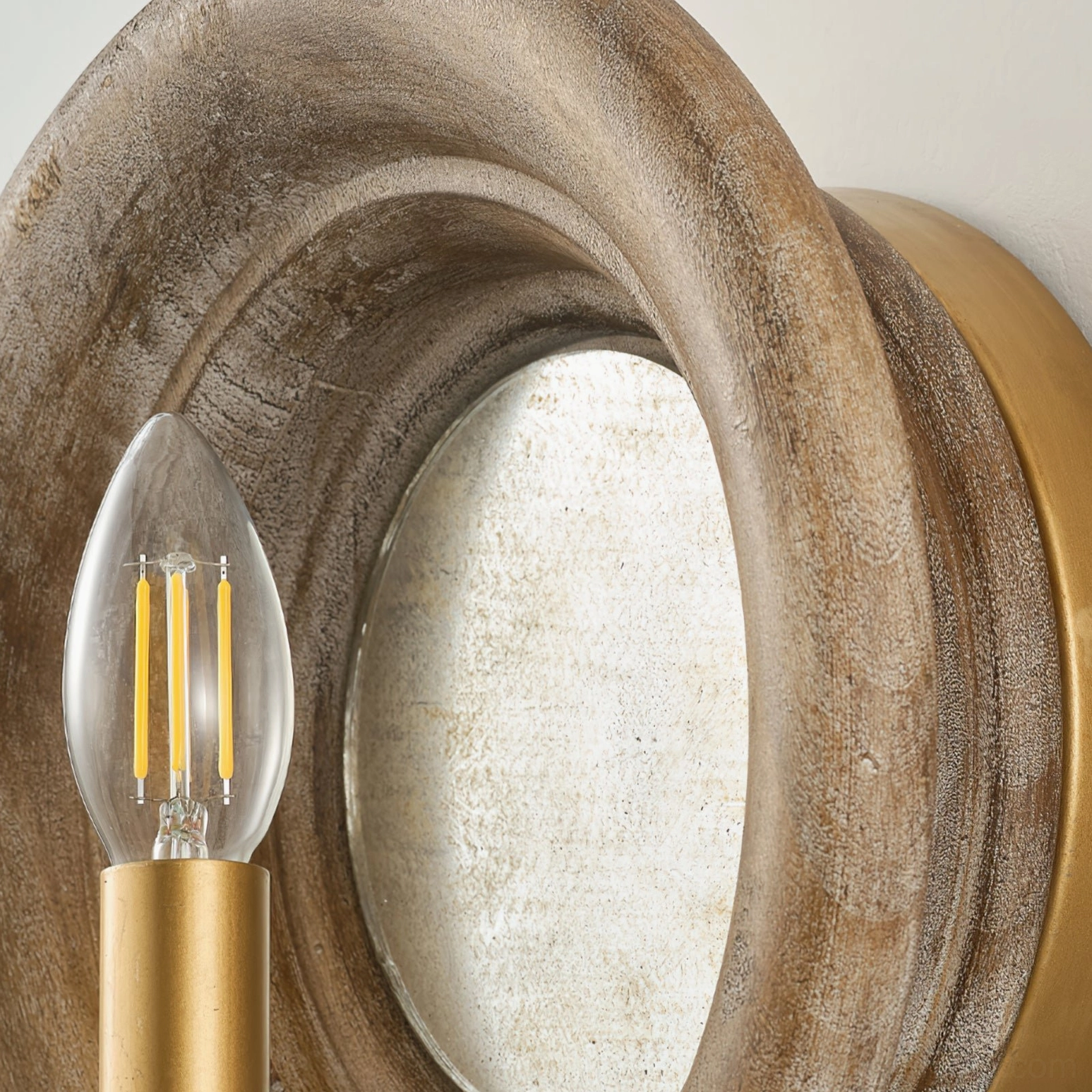 Finn wall lamp component side view showing distressed wood frame, vintage mirror, and filament bulb stem