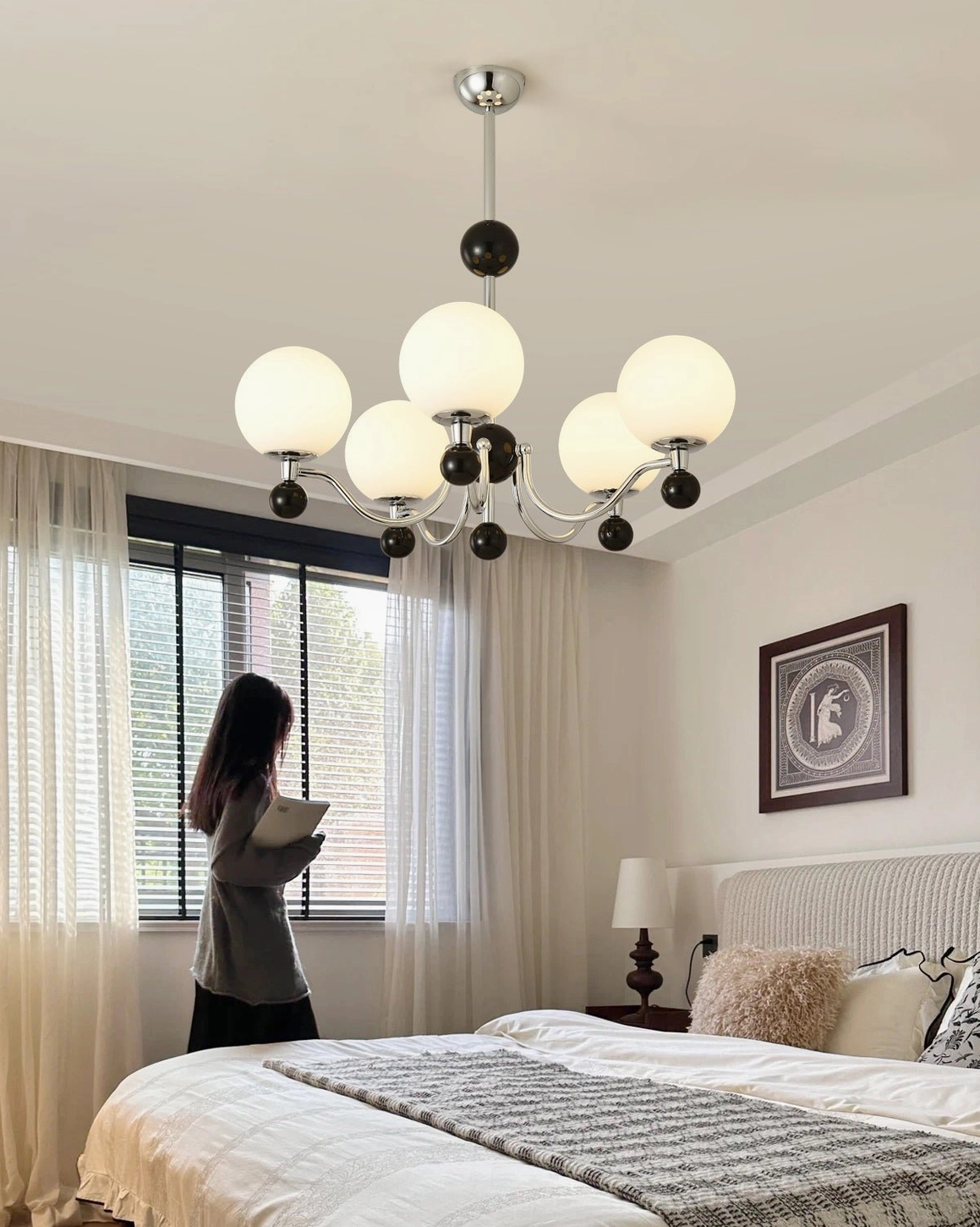 Contemporary five-head spherical chandelier in neutral color palette living space