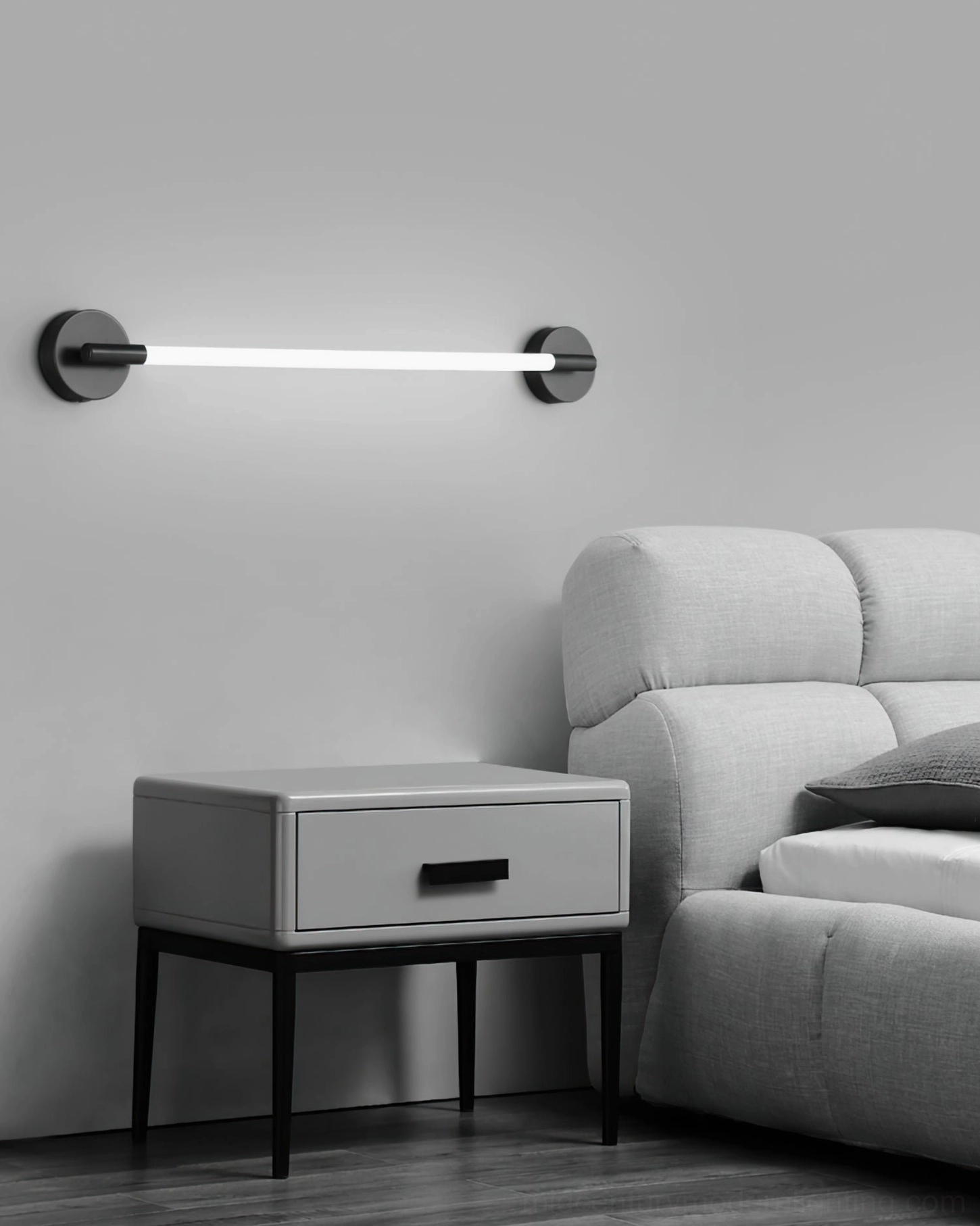 Installation view of Flecto Tube wall lamp showing proper mounting and electrical integration with external wall switch