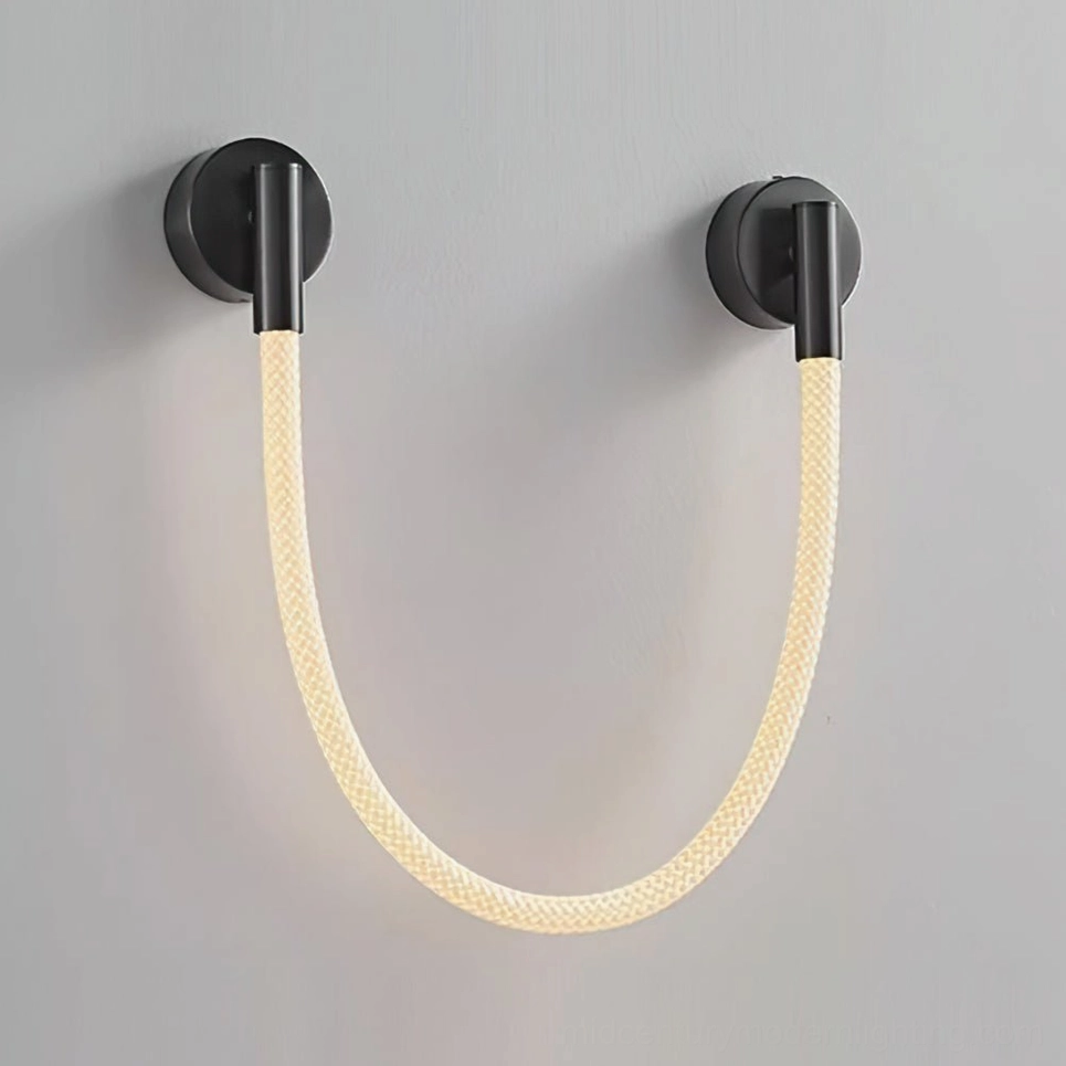 Flecto Tube Model A black and warm light wall lamp standard size installed as bedroom accent lighting