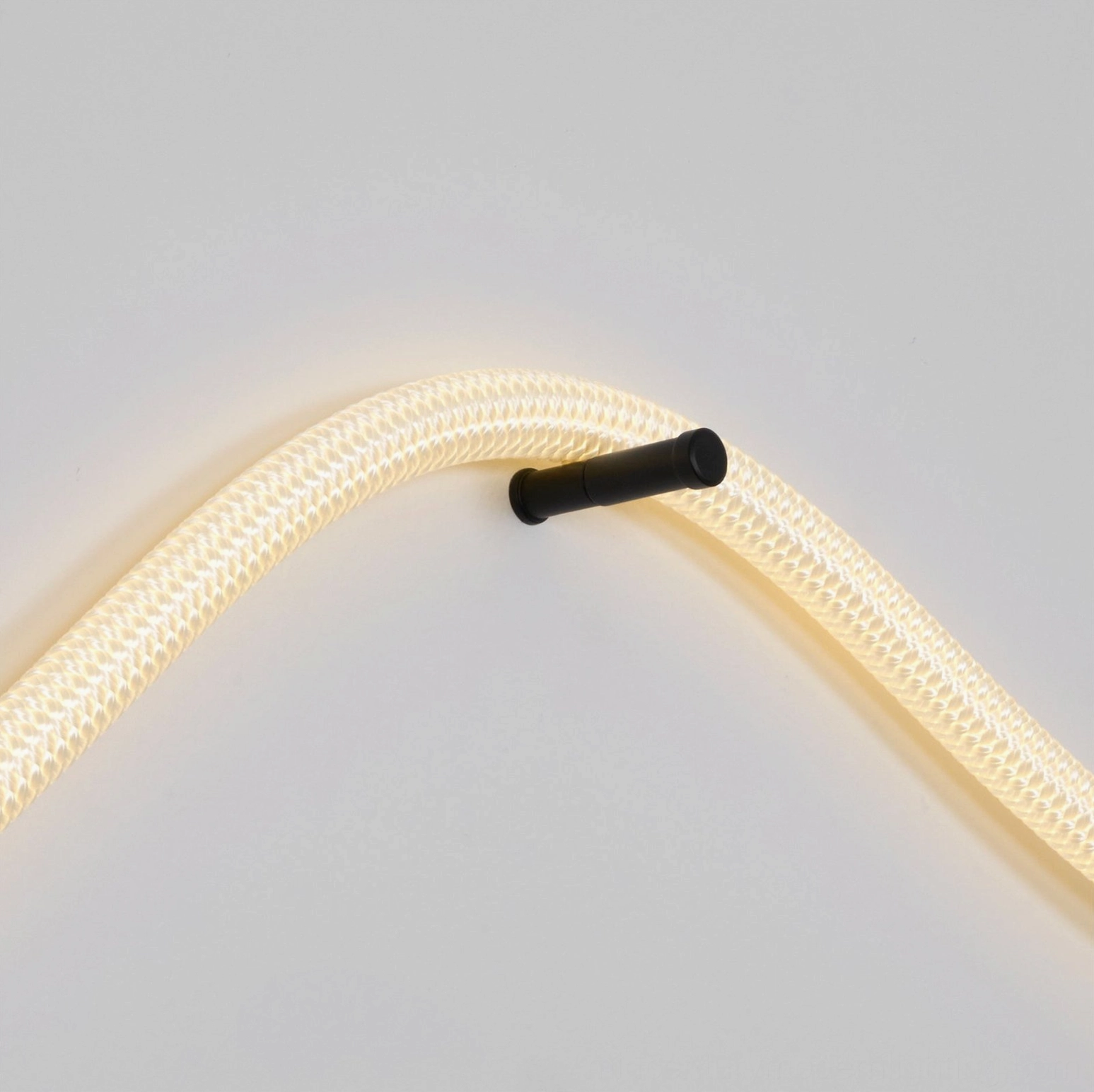 Flecto Tube Model B extended length installation showing 150cm full-wall sculptural lighting feature