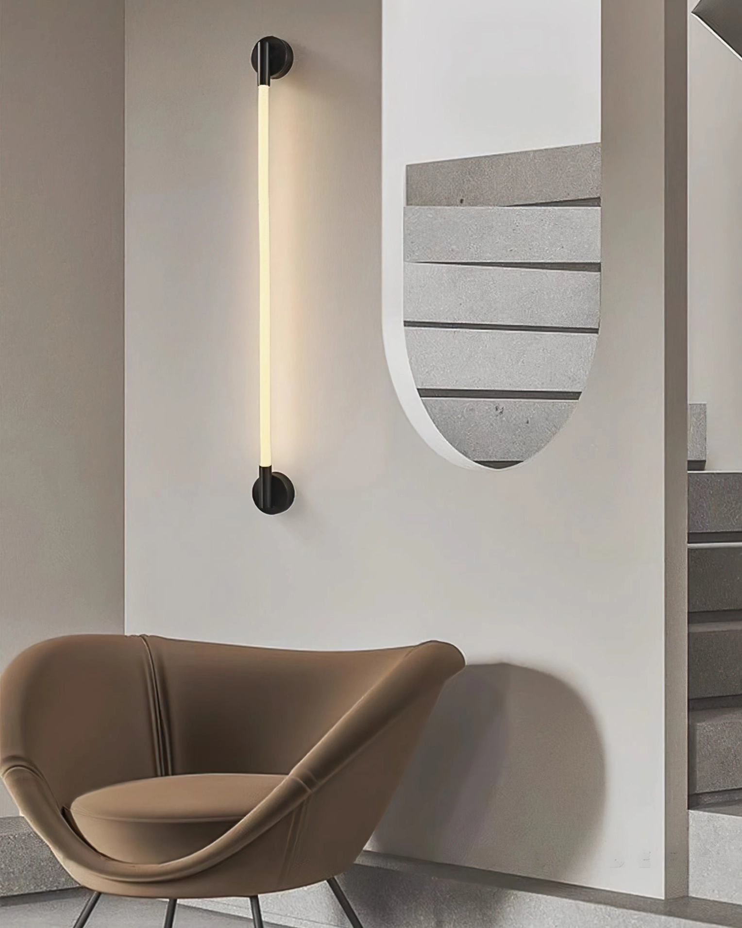 Flecto Tube wall lamp in white finish mounted on modern wall demonstrating clean minimalist aesthetic