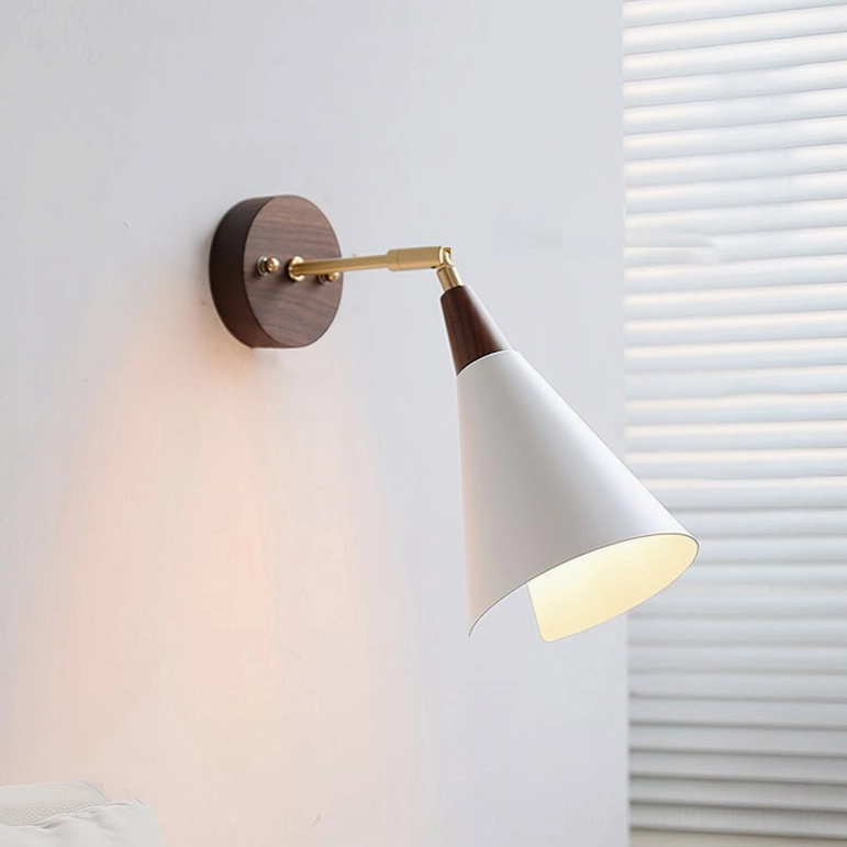 Fleka wall sconce with zipper cord-pull switch variant, walnut wood base and brass components, bedroom wall mounting