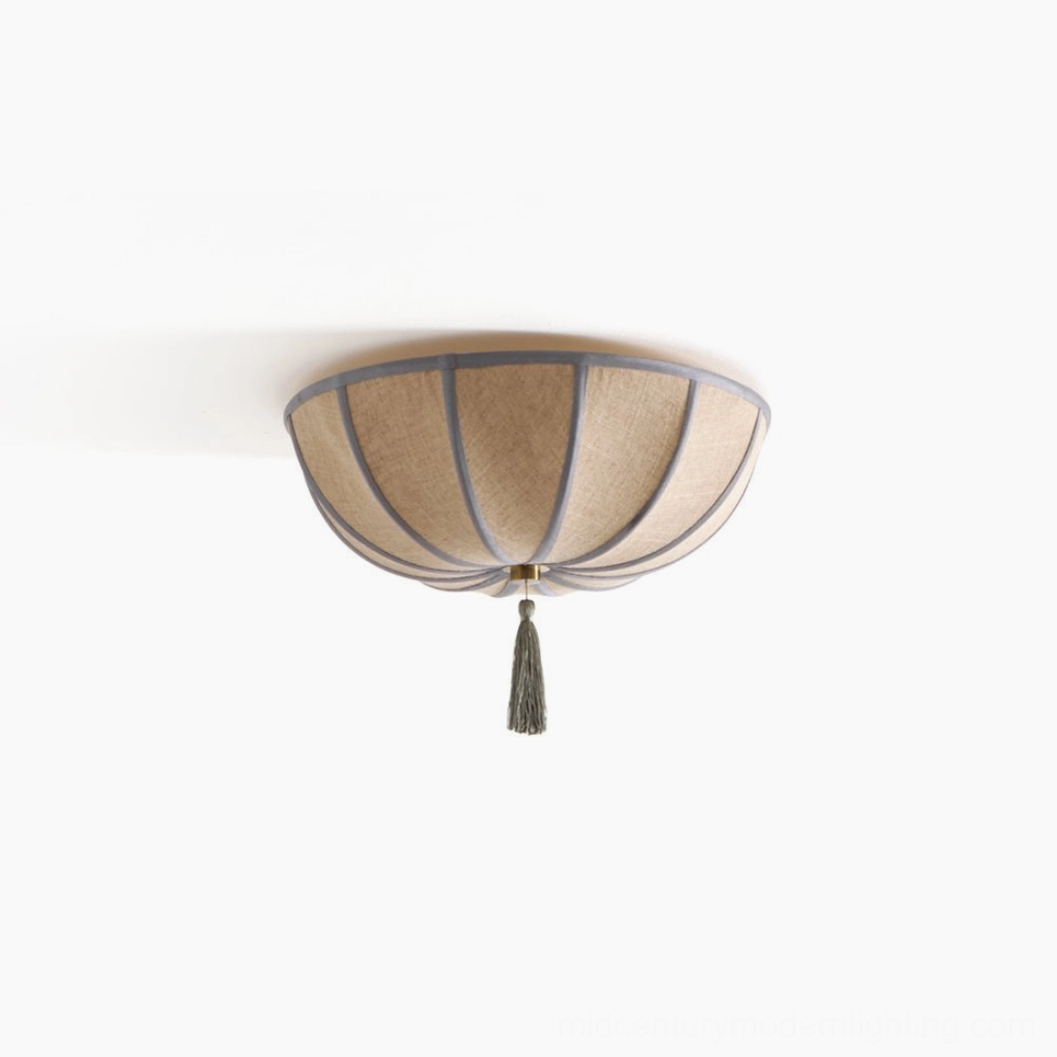 Fleur vintage fabric ceiling light with tassel, low-angle view on white background showing blooming flower silhouette and warm beige shade