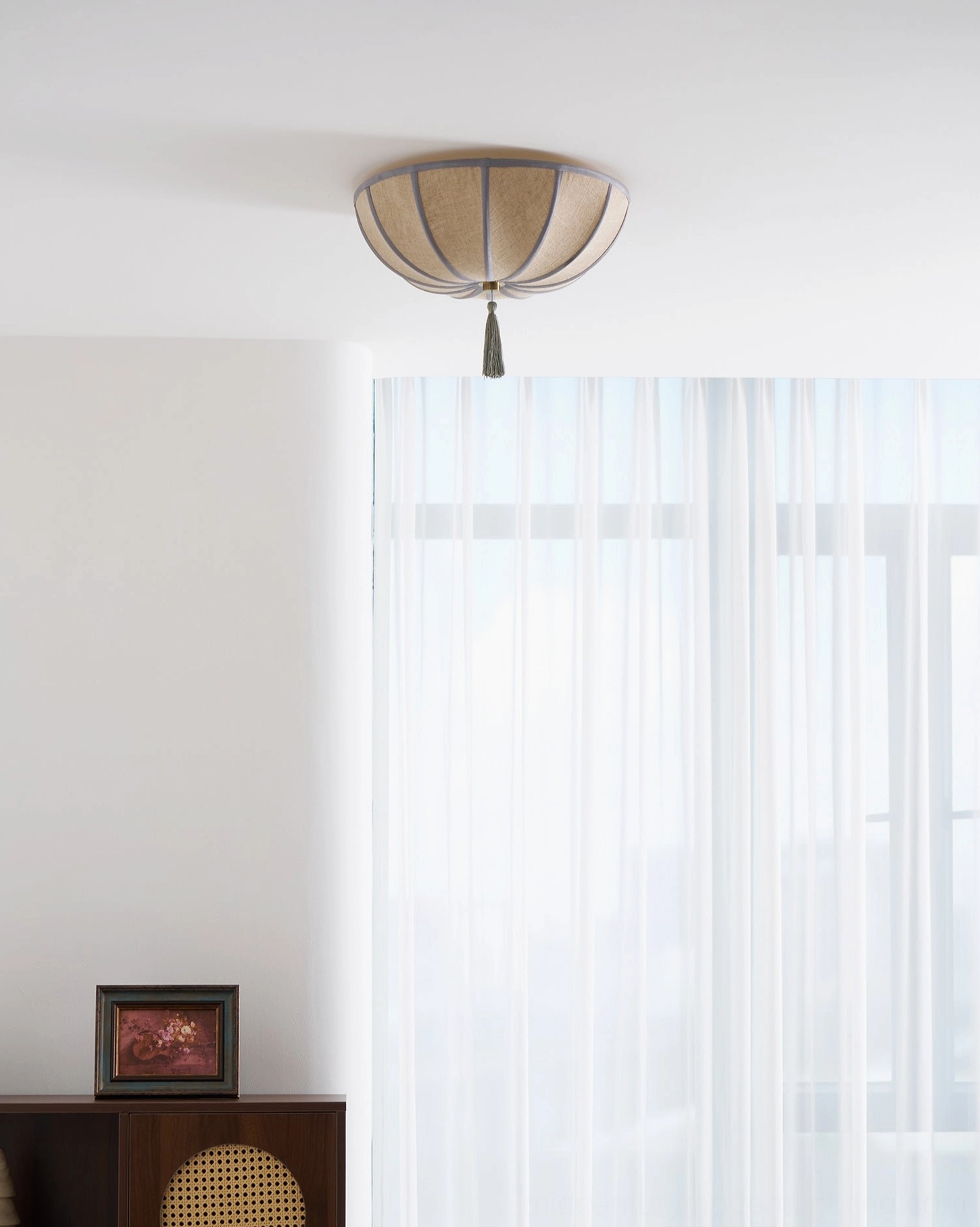 Fleur fabric shade ceiling light featuring sage green trim and beige woven material detail