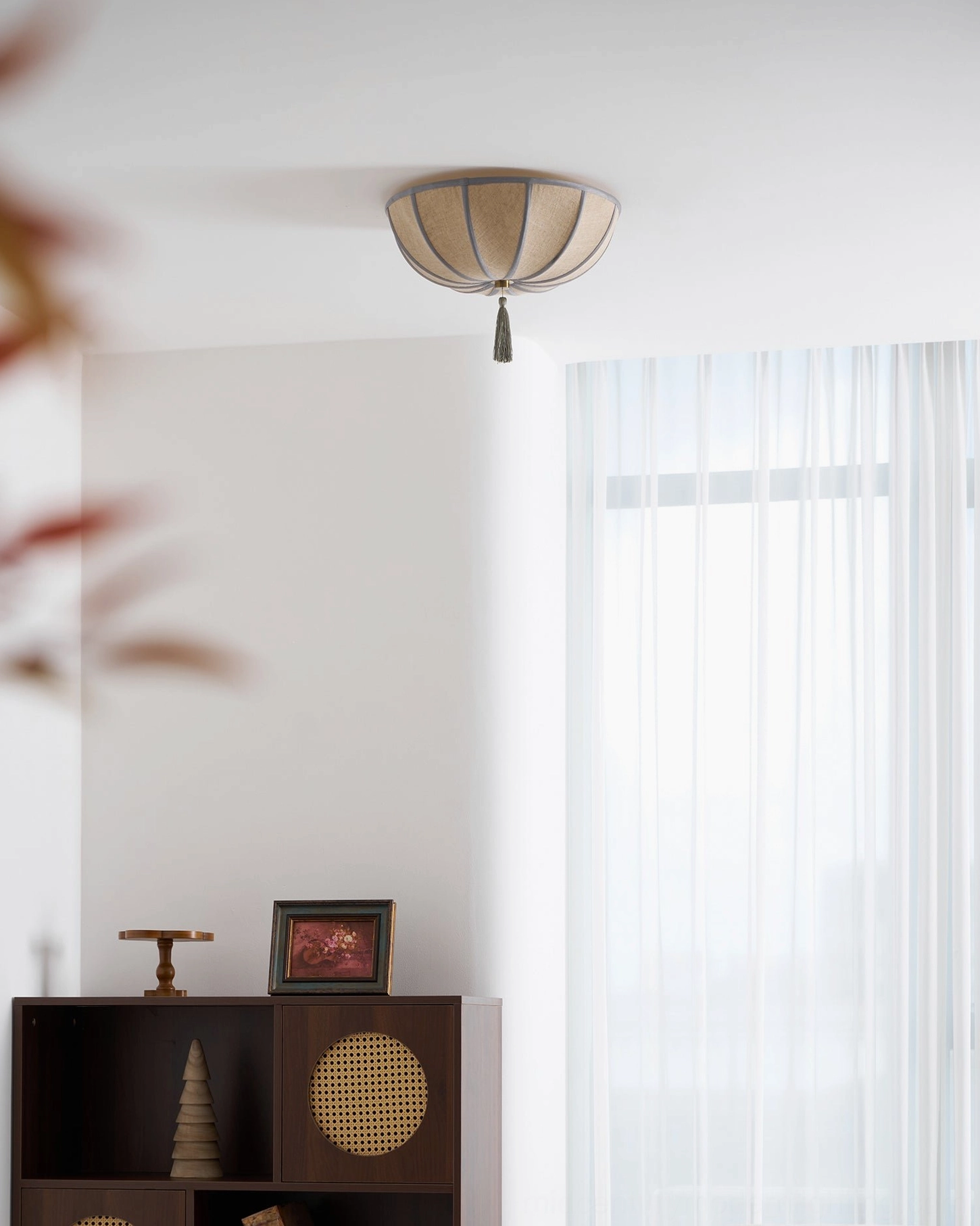 Fleur fabric ceiling light side view in minimalist boho interior with compact lamp size and neutral furnishings