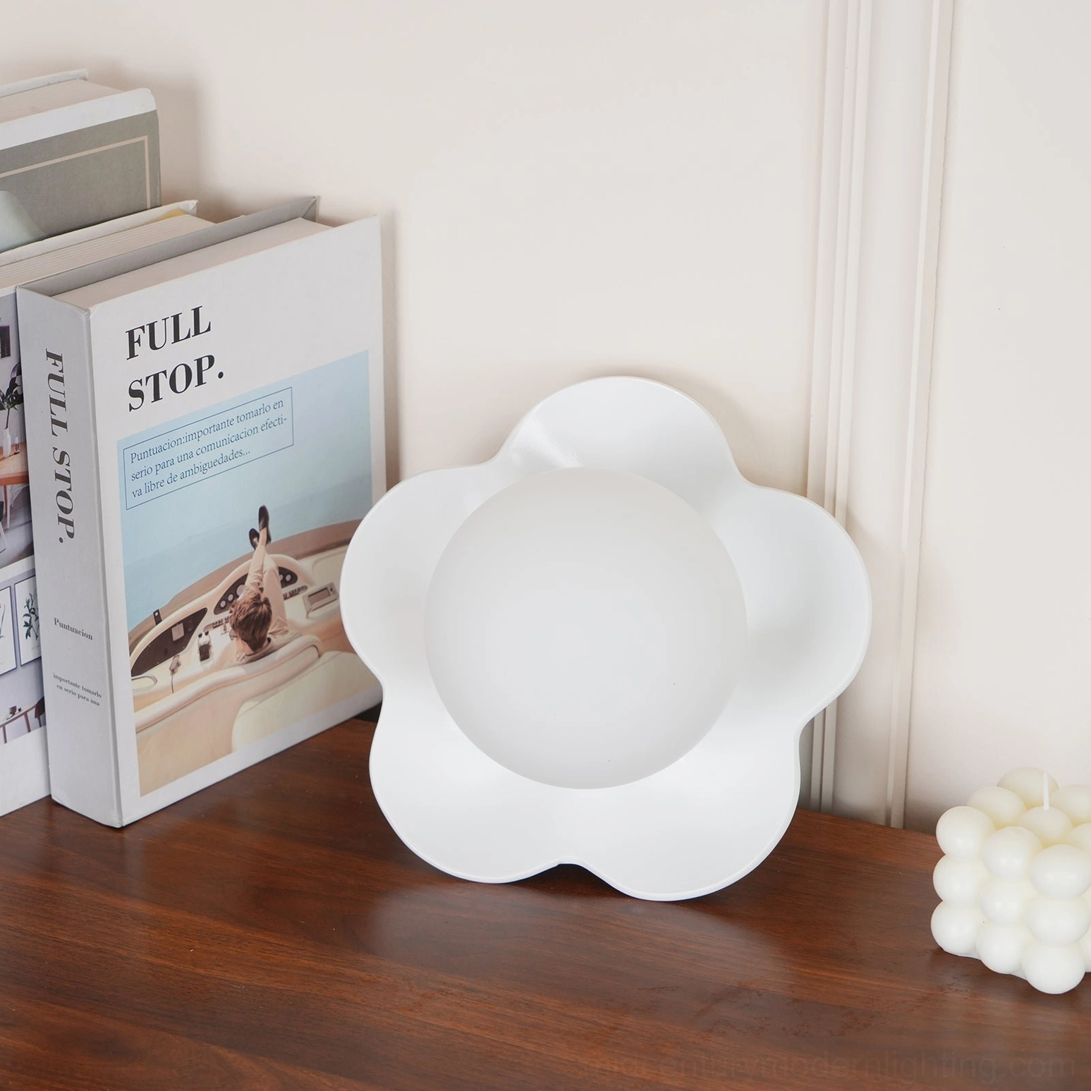 La Fleur five-petal wall lamp illuminated warm glow ambient lighting design
