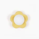 La Fleur botanical wall lamp in soft yellow resin with frosted glass diffuser, front studio view