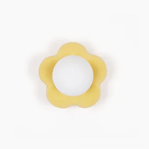 La Fleur botanical wall lamp in soft yellow resin with frosted glass diffuser, front studio view