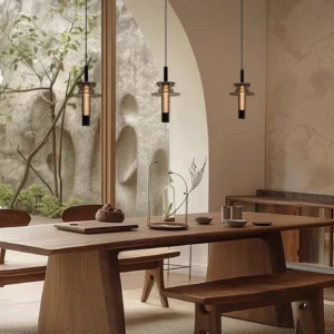 Multiple float pendant lights suspended above wooden dining table with outdoor scenery, warm ambient lighting