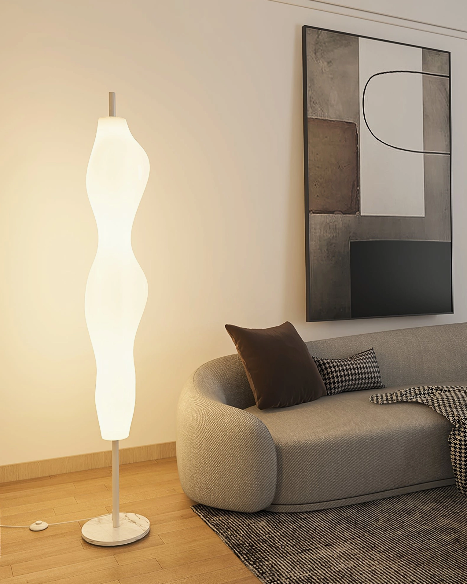 Biomorphic white floor lamp with metal base and foot switch control detail