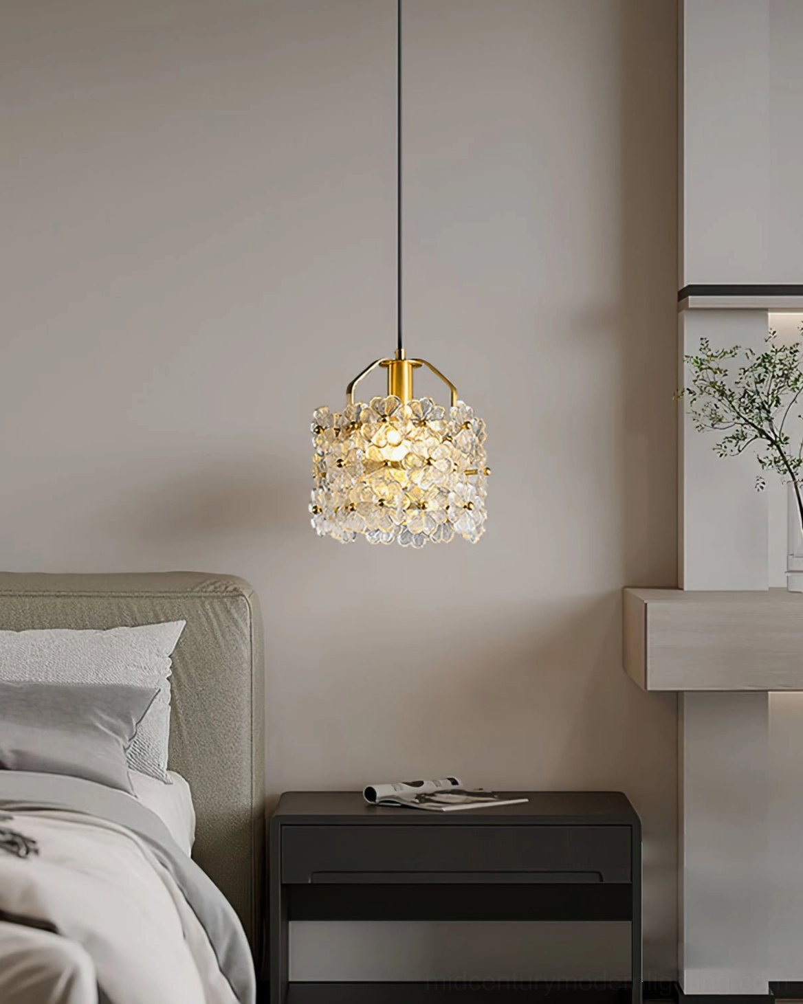 Delicate glass flower pendant lamp in compact bedroom creating intimate warm lighting atmosphere