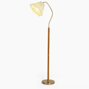 Florentine mid-century fabric floor lamp with brass gooseneck arm and turned walnut wood column on white background