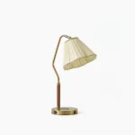Florentine pleated fabric table lamp with brass base, front studio view