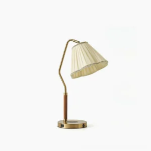 Florentine pleated fabric table lamp with brass base, front studio view