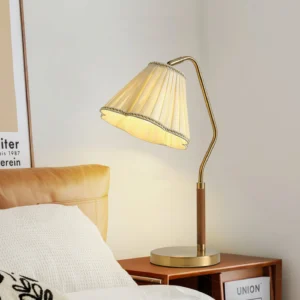 Florentine table lamp on bedroom bedside table, three-quarter side angle
