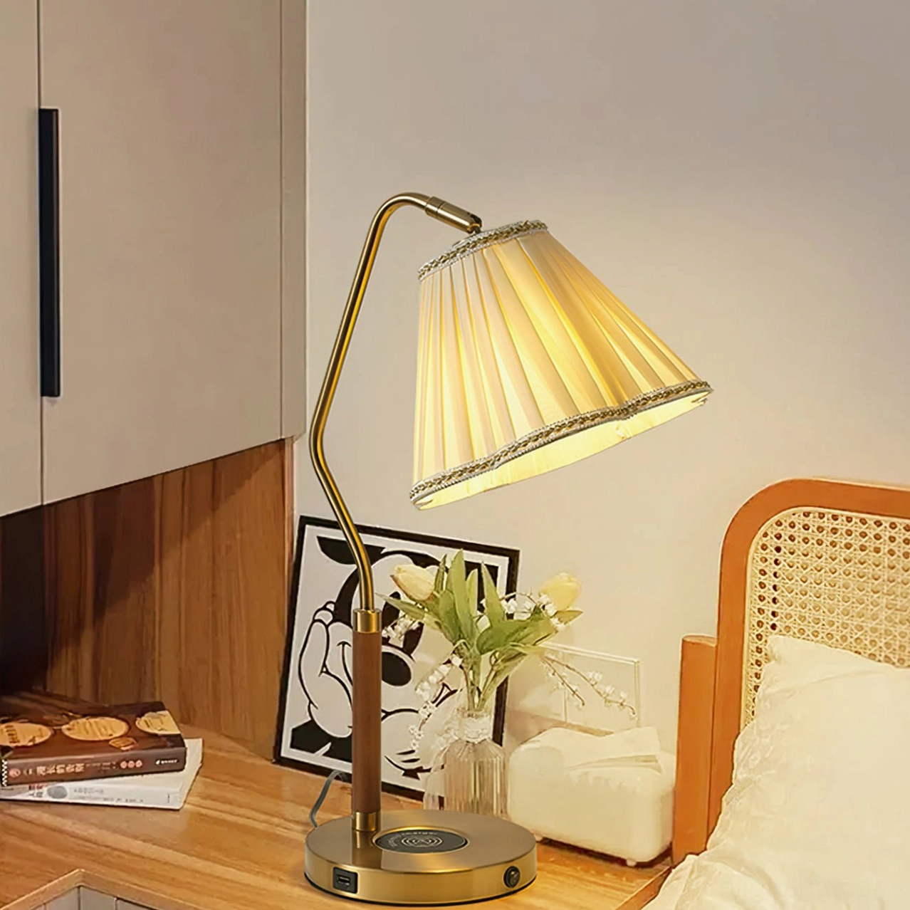 Florentine pleated lamp creating ambient lighting on bedroom desk