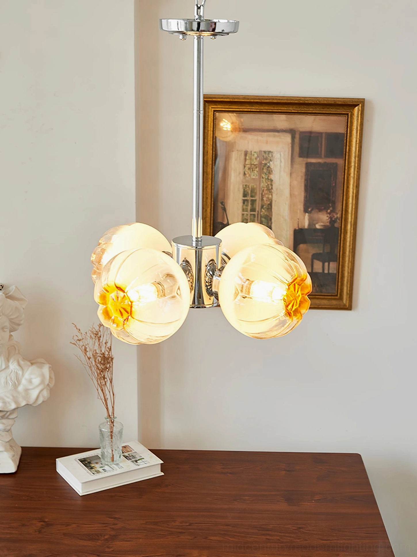4-head Flower Bud Chandelier with dual pairs of amber glass shades in vintage French dining setting