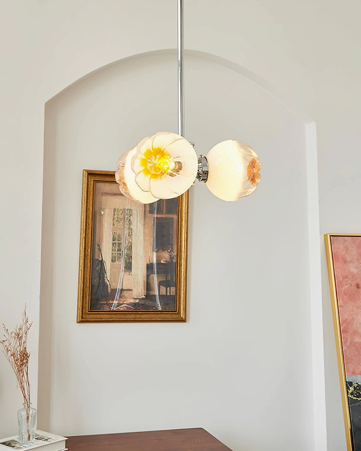 Flower Bud Chandelier three-quarter angle showing dual amber shades and closed flower bud form with chrome hardware