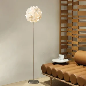 Contemporary flower floor lamp in modern lounge corner with beige wall and wooden grid decoration