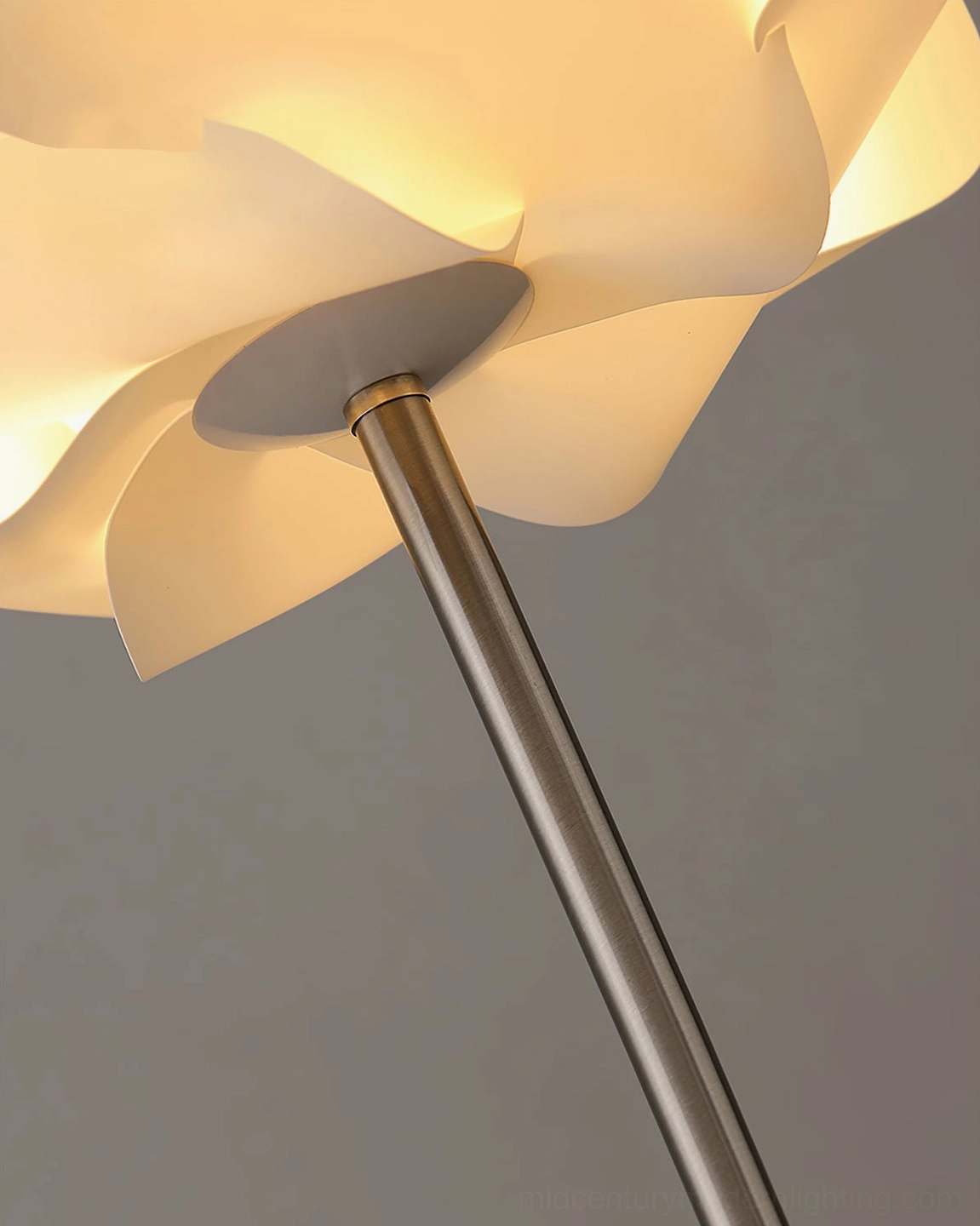 Contemporary flower floor lamp multiple angles showcase sleek metal pole construction