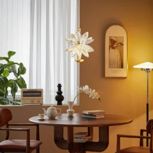 Glam crystal flower pendant lamp styled in vintage dining room corner with retro accessories