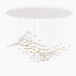 Modern fluid glass chandelier with cascading clear and golden pendants overhead flat view minimalist design