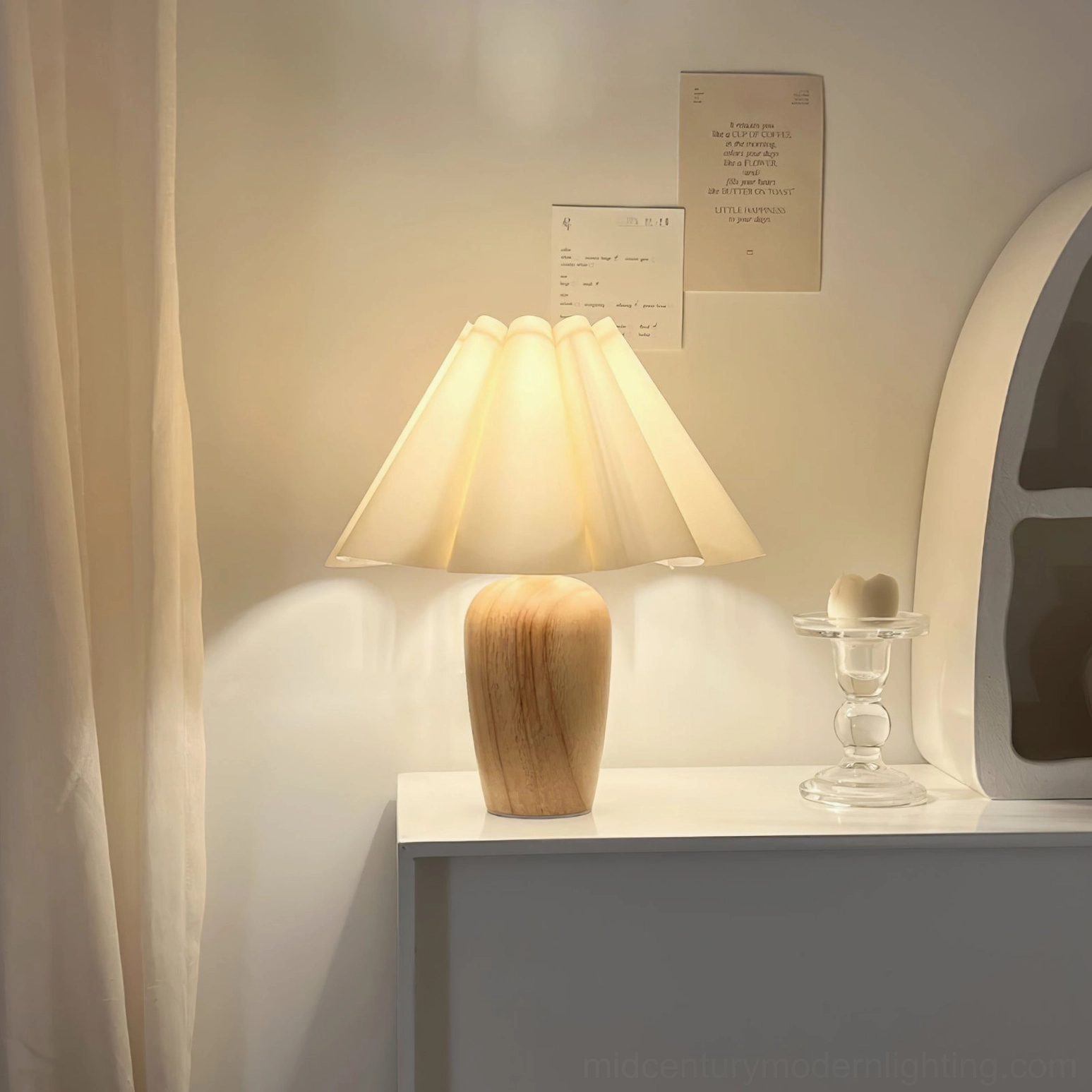 Illuminated vintage fluted table lamp creating soft warm glow on bedroom nightstand in cozy evening lighting