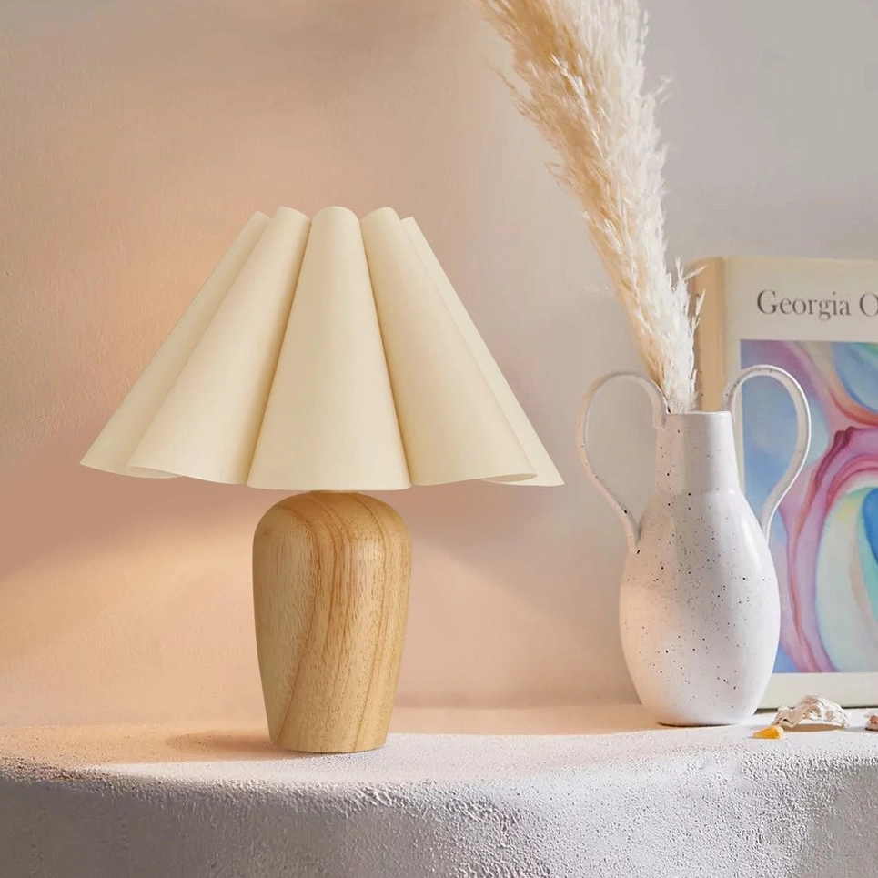 Vintage table lamp displayed on vanity with dried floral decor and warm boho neutral home styling ambiance