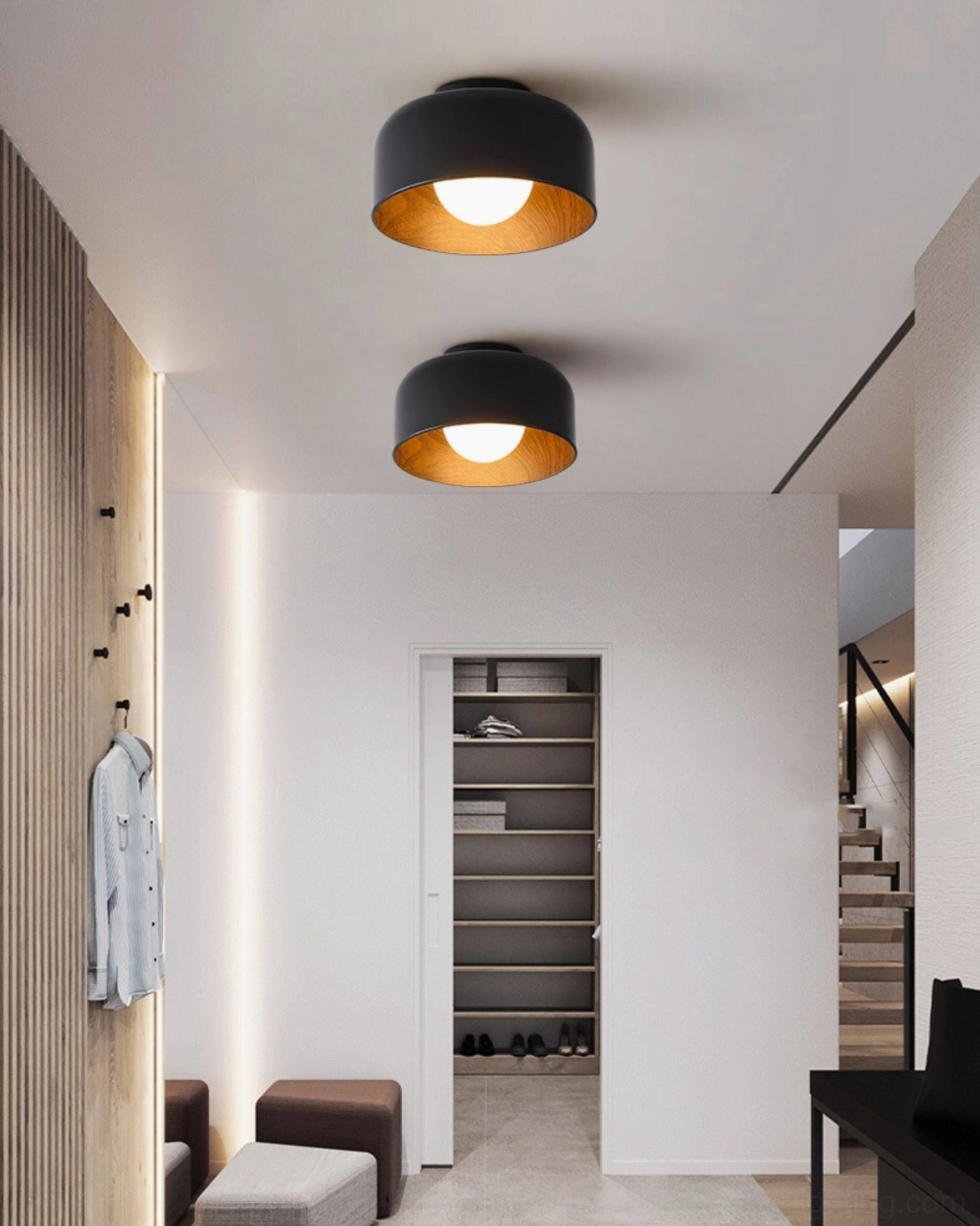 Pair of Folkio black flush mount ceiling lights installed in modern Nordic minimalist entryway with neutral decor