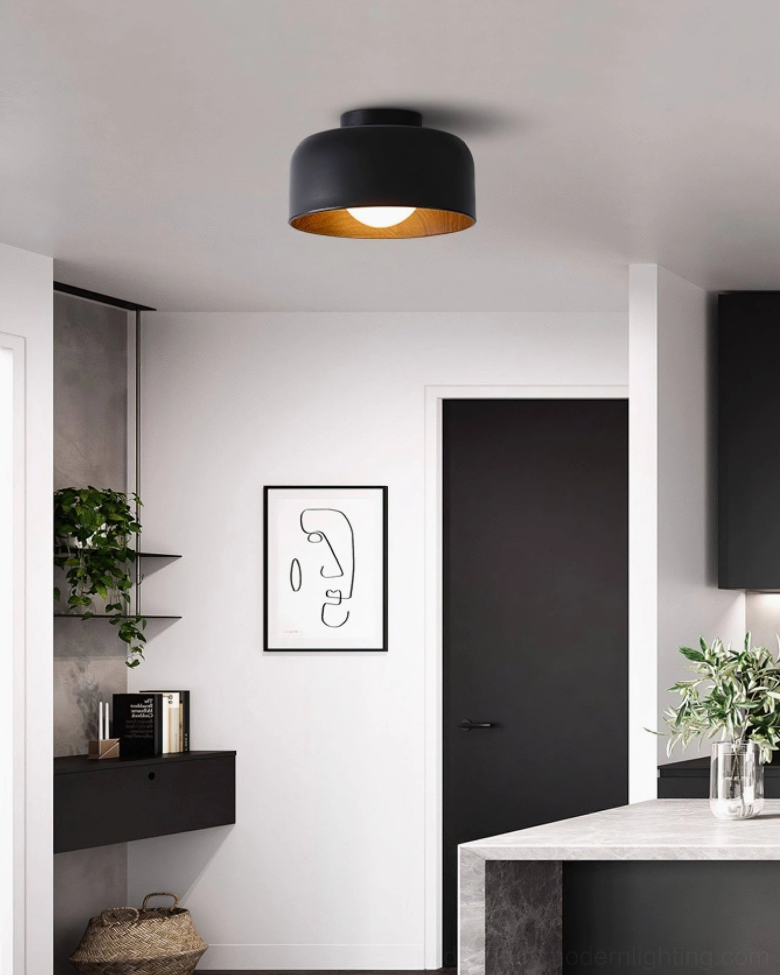 Folkio black flush mount ceiling light in modern kitchen dining area with dark home accents and wood tones