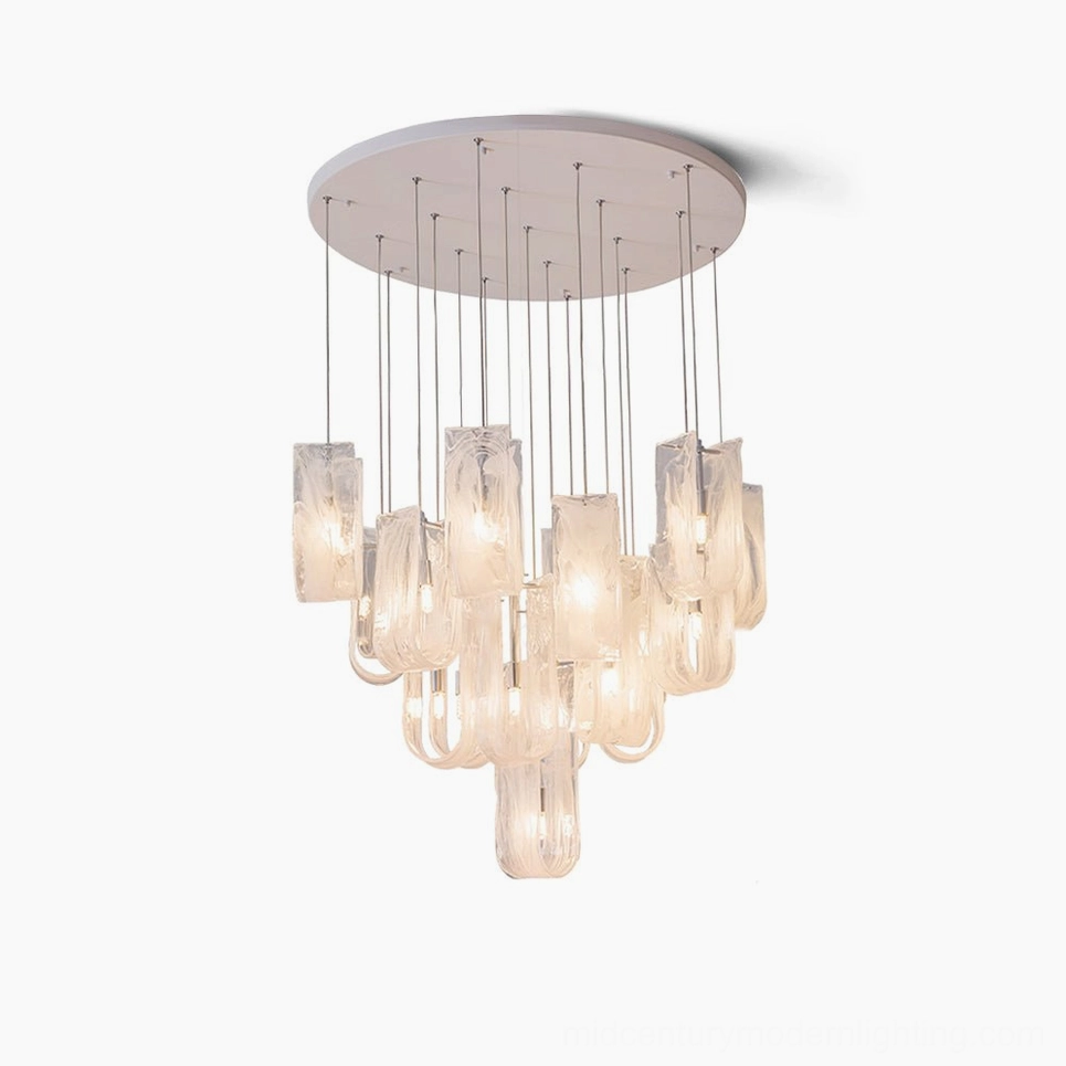 Fontaine cascading glass chandelier with gradient amber textured pendants on white background, modern sculptural pendant lighting design
