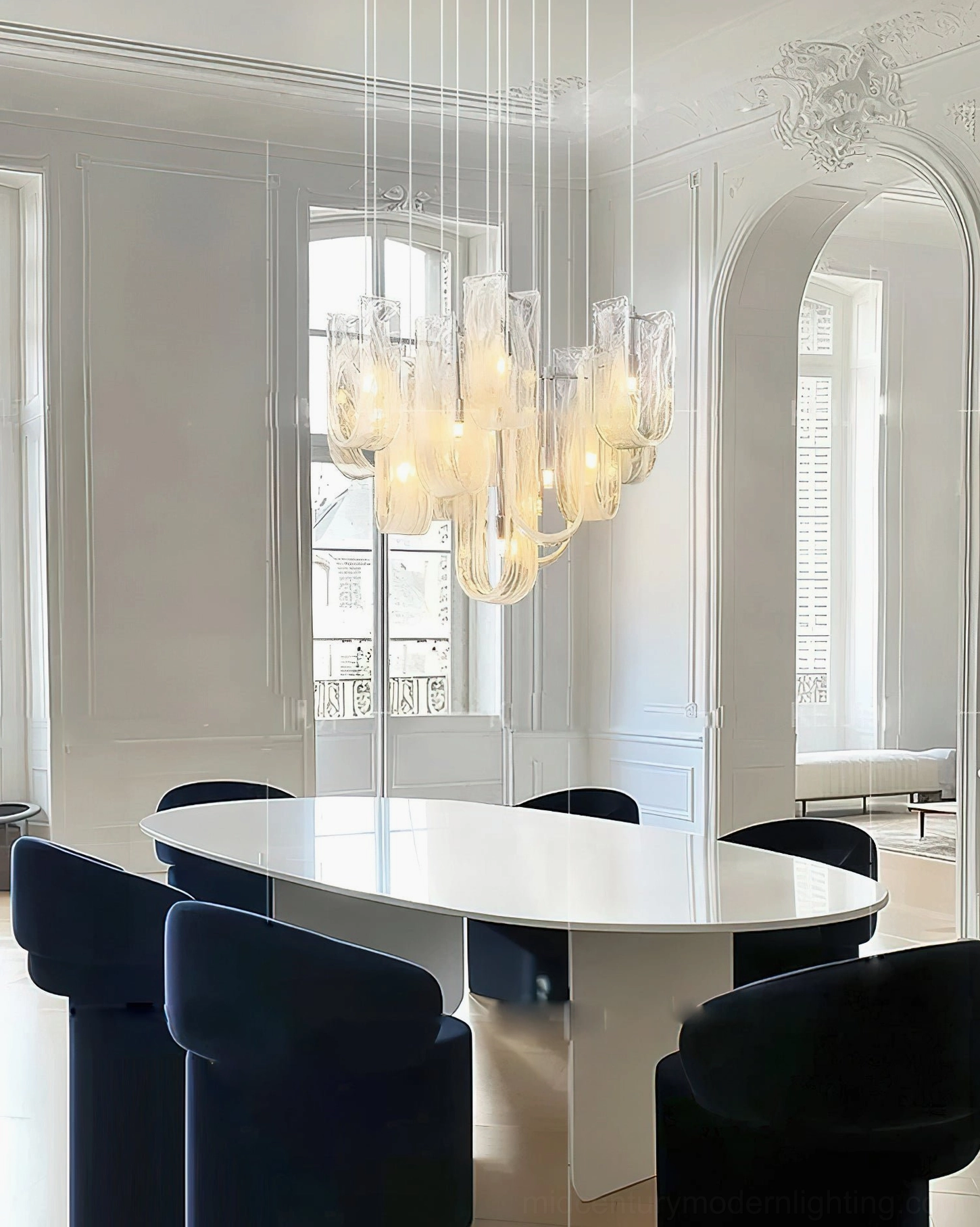 Fontaine cascading glass chandelier detail view showing gradient amber texture and sculpted pendant craftsmanship