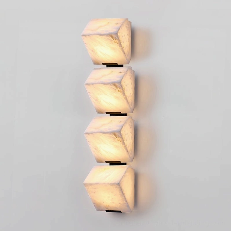 Four-light alabaster staircase wall lamp full installation showcasing maximum light output and sculptural impact