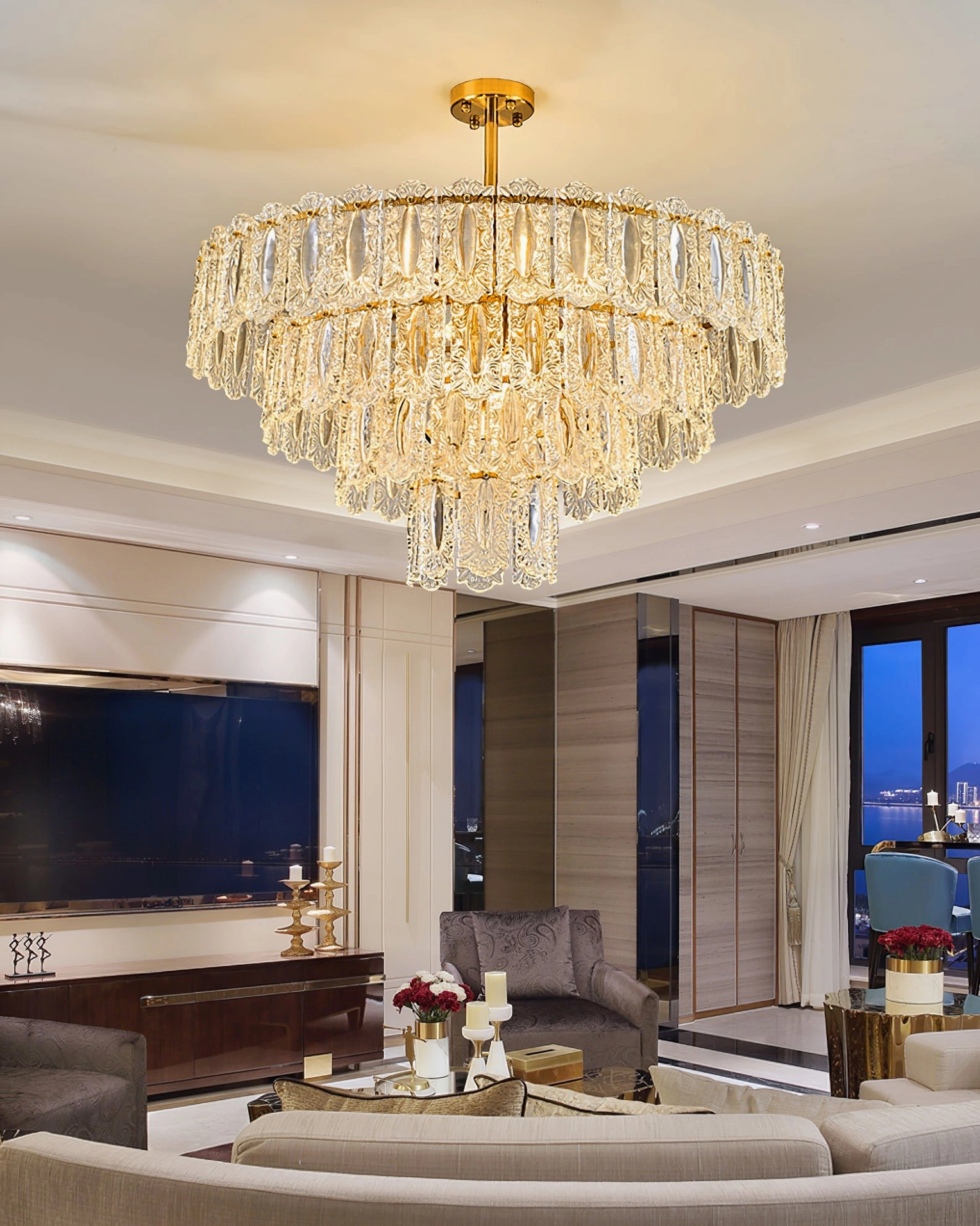 Four-tier Vienna crystal chandelier overhead view in modern luxury living room with warm ambient lighting