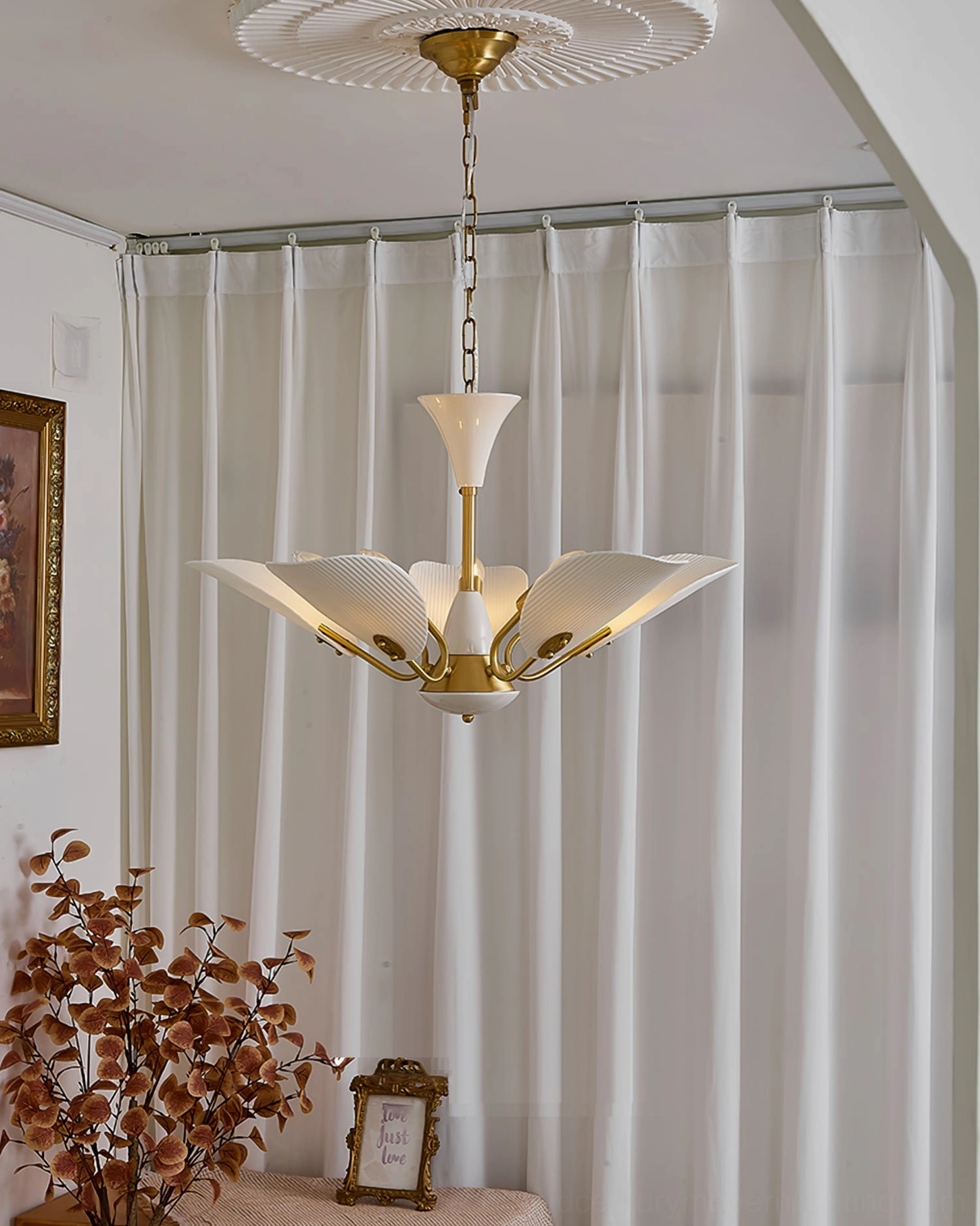 Franco ceramic petal chandelier full illumination showing warm light distribution through ceramic shades