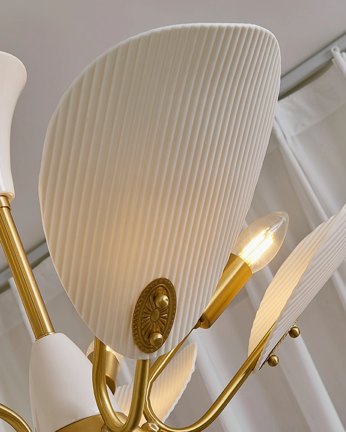Franco ceramic petal chandelier textured ceramic petals and brass metal components close-up detail