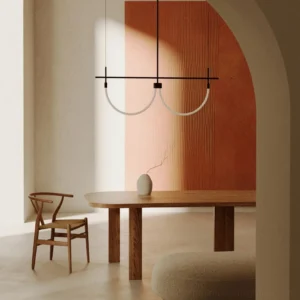 Freja pendant light installation in wabi-sabi dining room with warm ambient lighting, wooden decor and minimalist table setting