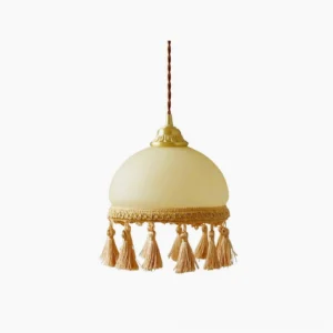 French tassel brass pendant light with embroidered fabric tassels in beige and brown, polished brass finish, studio flat lay front view
